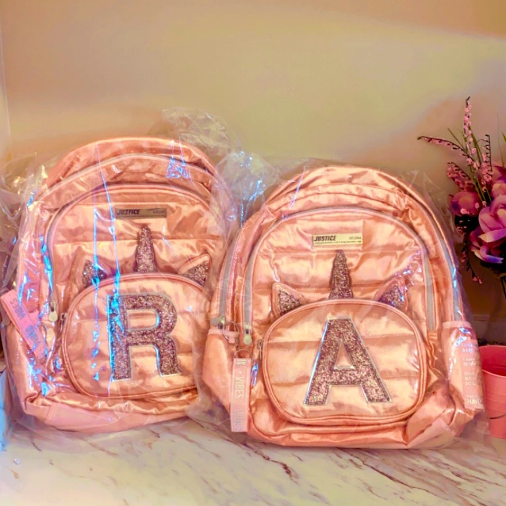 JUSTICE MONOGRAM BACKPACK